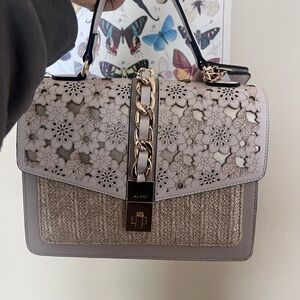 Aldo gold bag, never worn, plastic still on